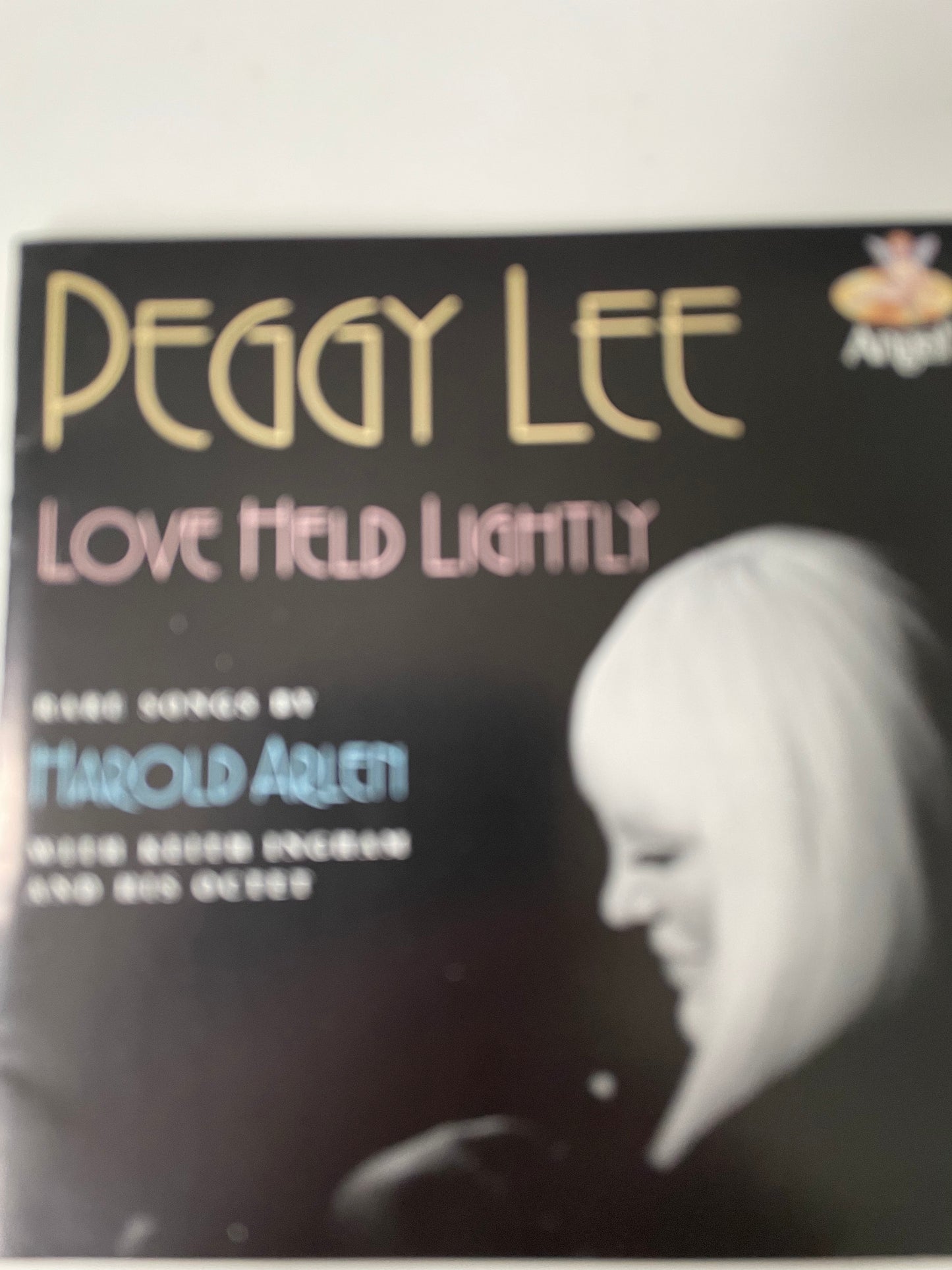 PEGGY LEE "LOVE HELD LIGHTLY"-$22.99 +SHIPPING $5.00