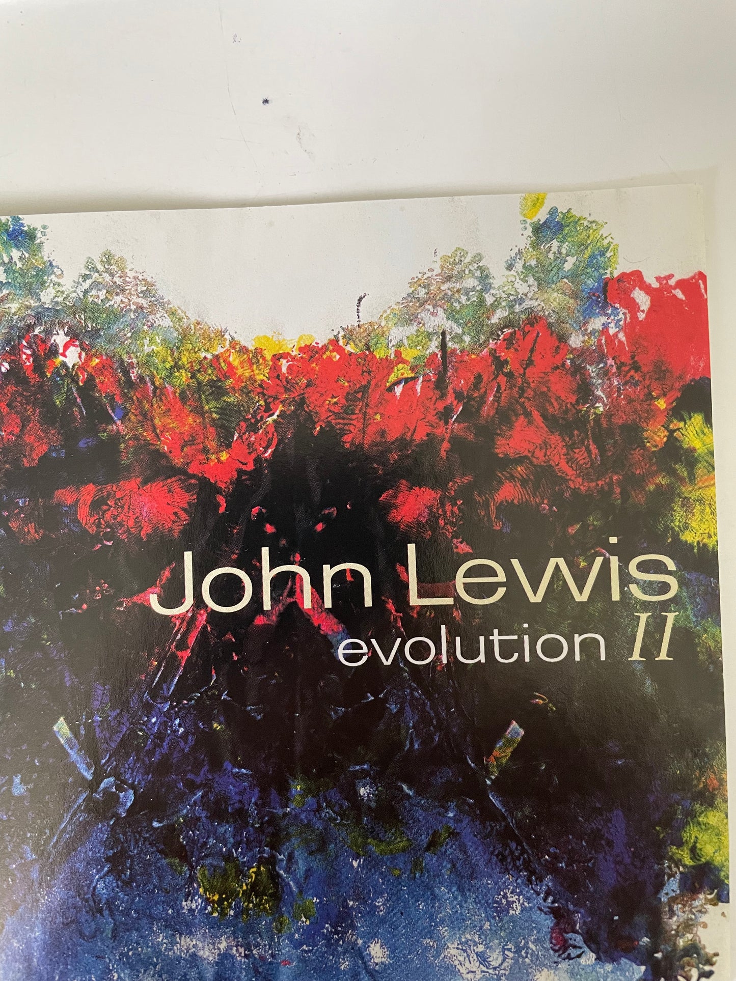 JOHN LEWIS "EVOLUTION II-$7.99 +SHIPPING $5.00