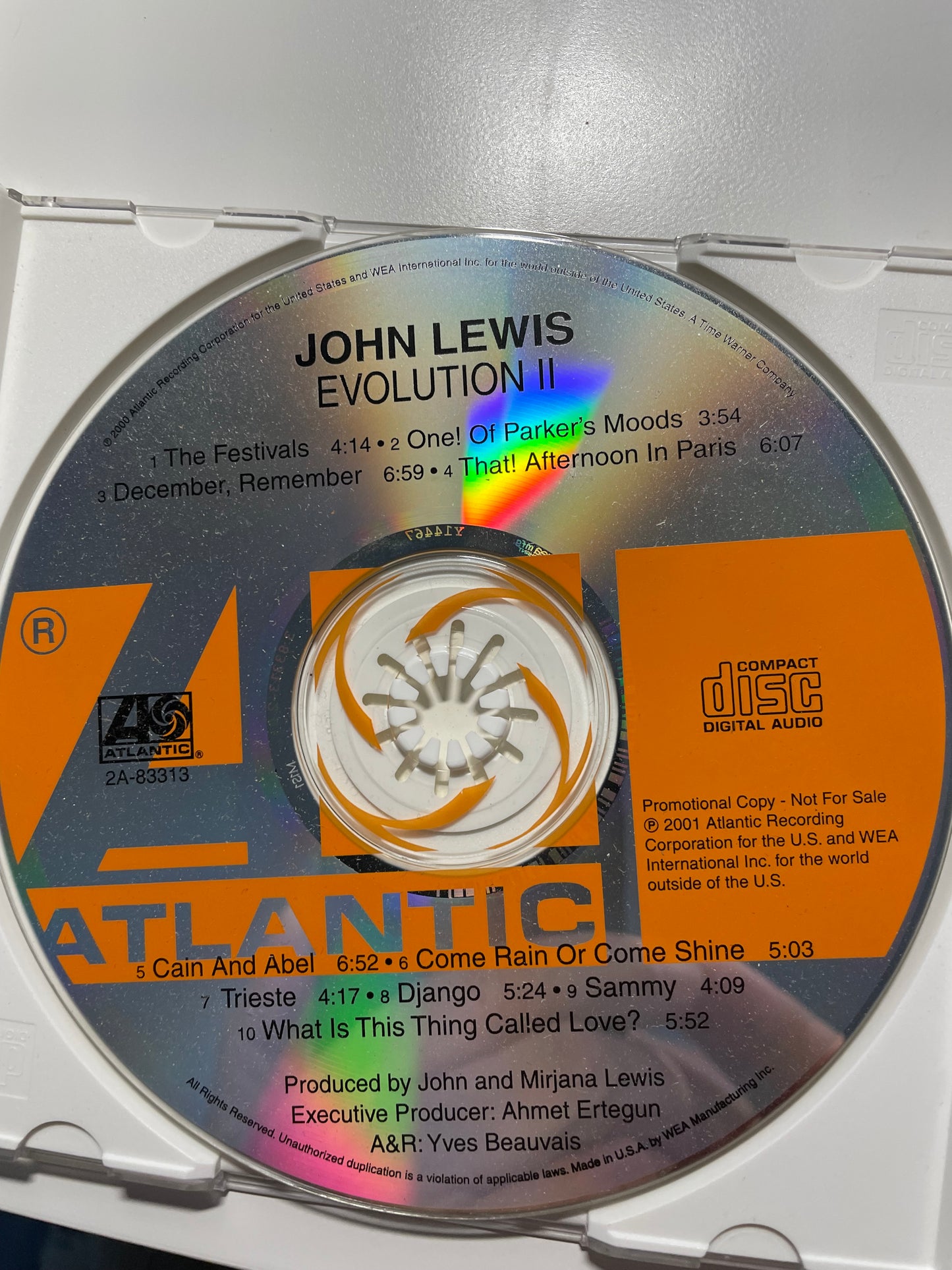 JOHN LEWIS "EVOLUTION II-$7.99 +SHIPPING $5.00