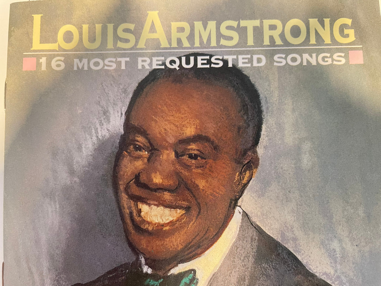 LOUIS ARMSTRONG "16 MOST REQUESTED SONGS"-$5.99 +SHIPPING $5.00