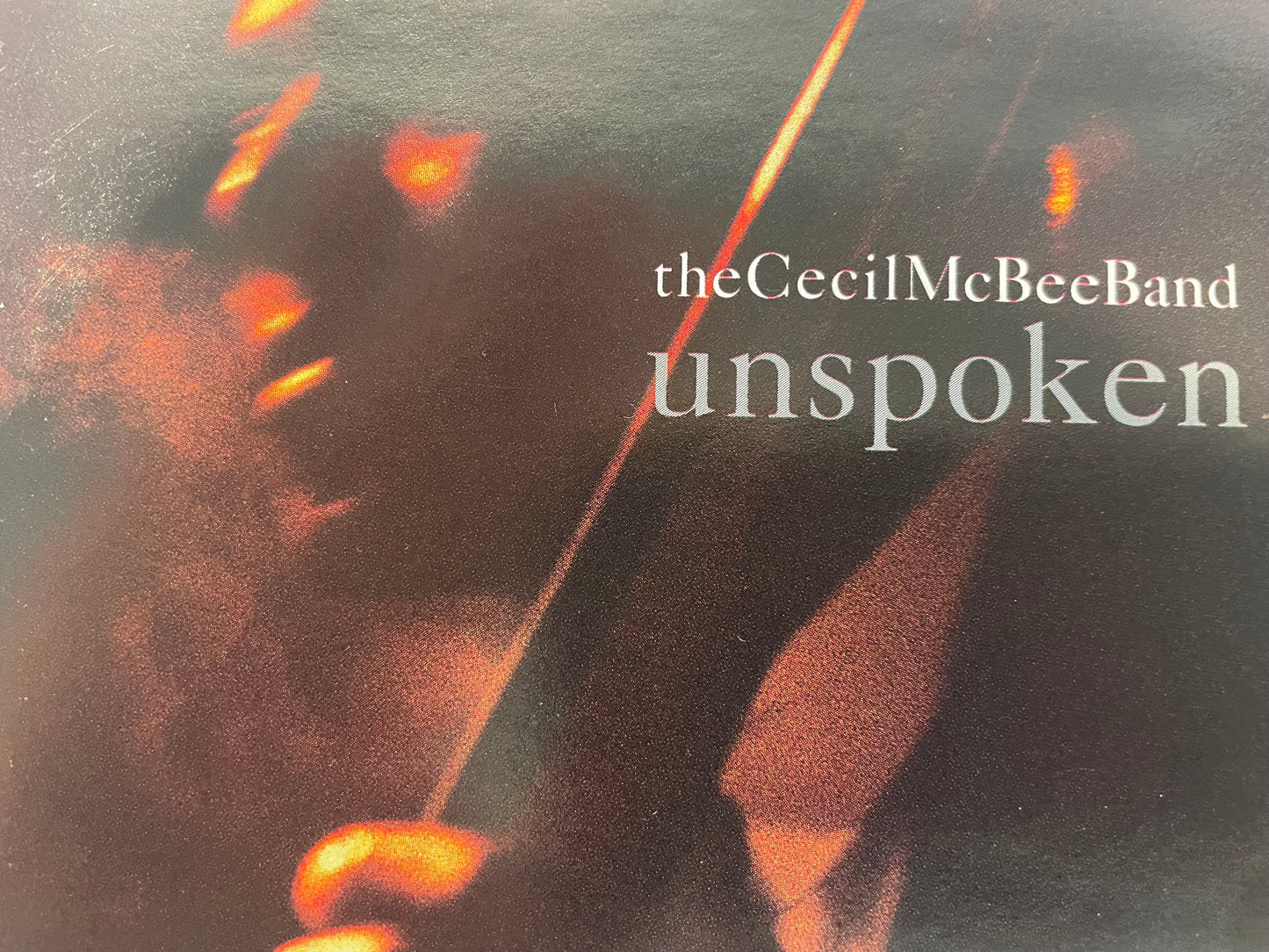 CECIL MCBEE BAND "UNSPOKEN"-$9.99 +SHIPPING $5.00